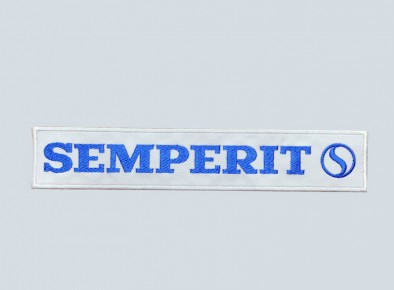 Logo firmy semperit wykonany w technologii haftu komputerowego